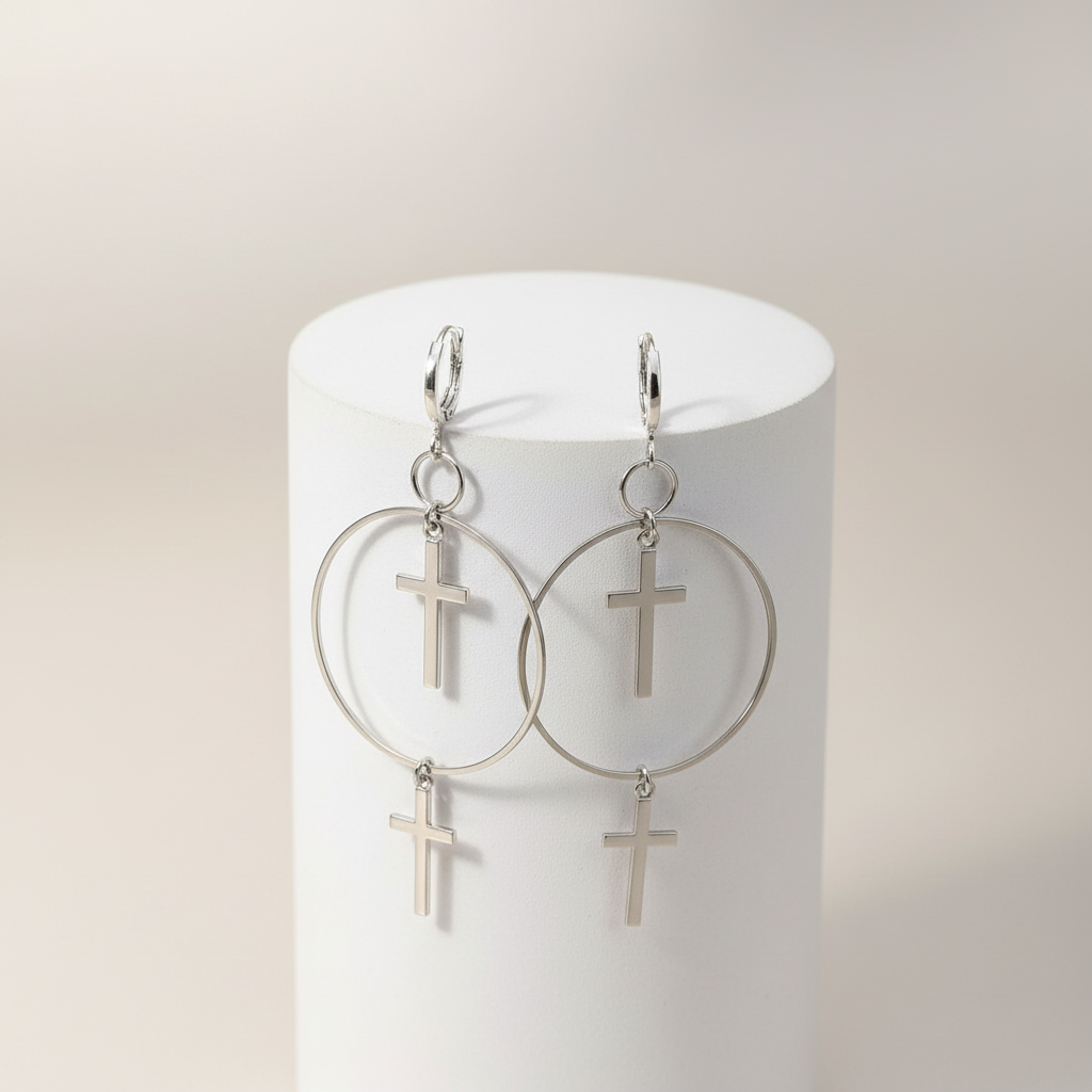 Cross earrings on pedestal