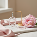 Elegant lifestyle shot of pink crystal leverback earrings